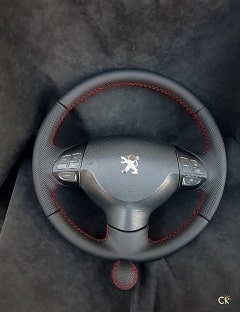 Перетяжка руля и ручки КПП на Пежо 4008 натуральной кожей